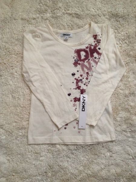 Blusa infantil manga longa Donna Karan